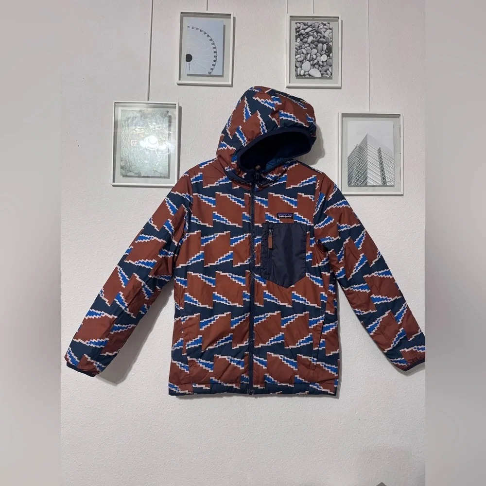 Patagonia Blue and Brown Puffer Jacket with Geometric Design